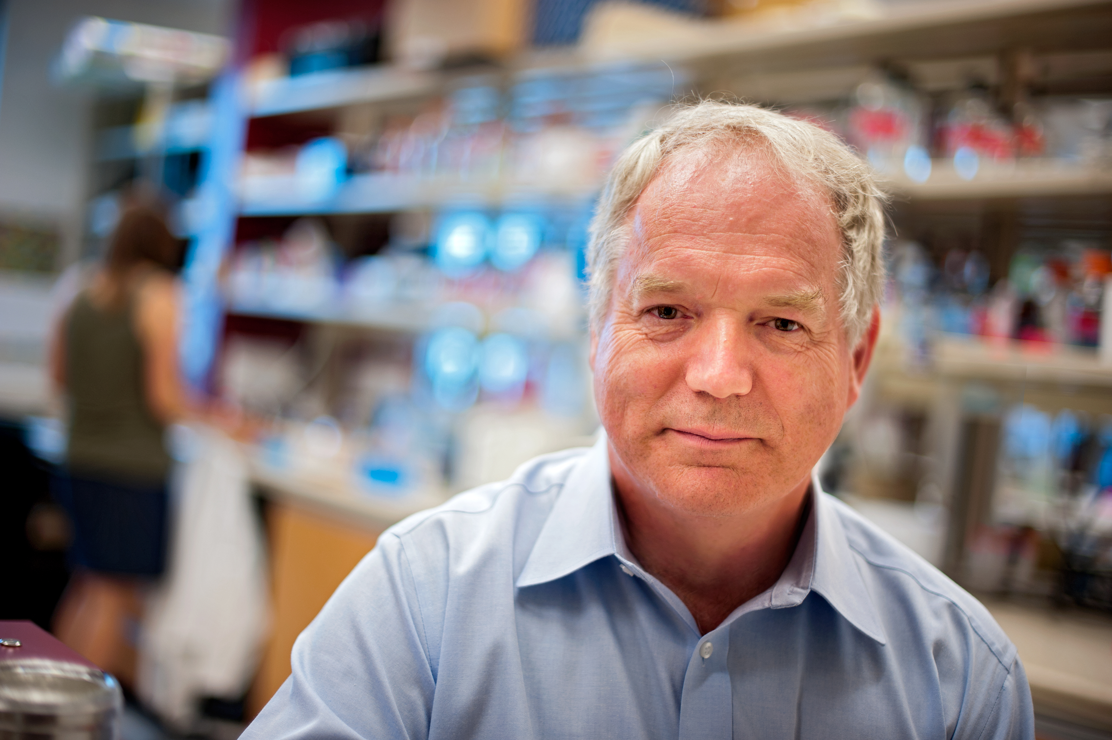 An image of Nobel Laureate Professor Michael Houghton with some books behind him